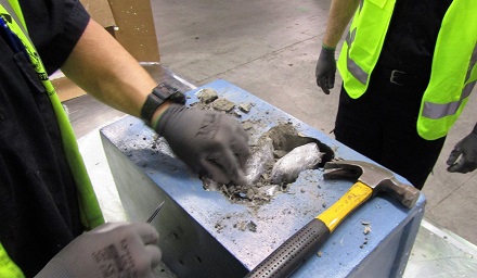 Canadian jailed for smuggling $8M meth in footstool Custolms officer smashing footstool containing smuggled methamphetamine